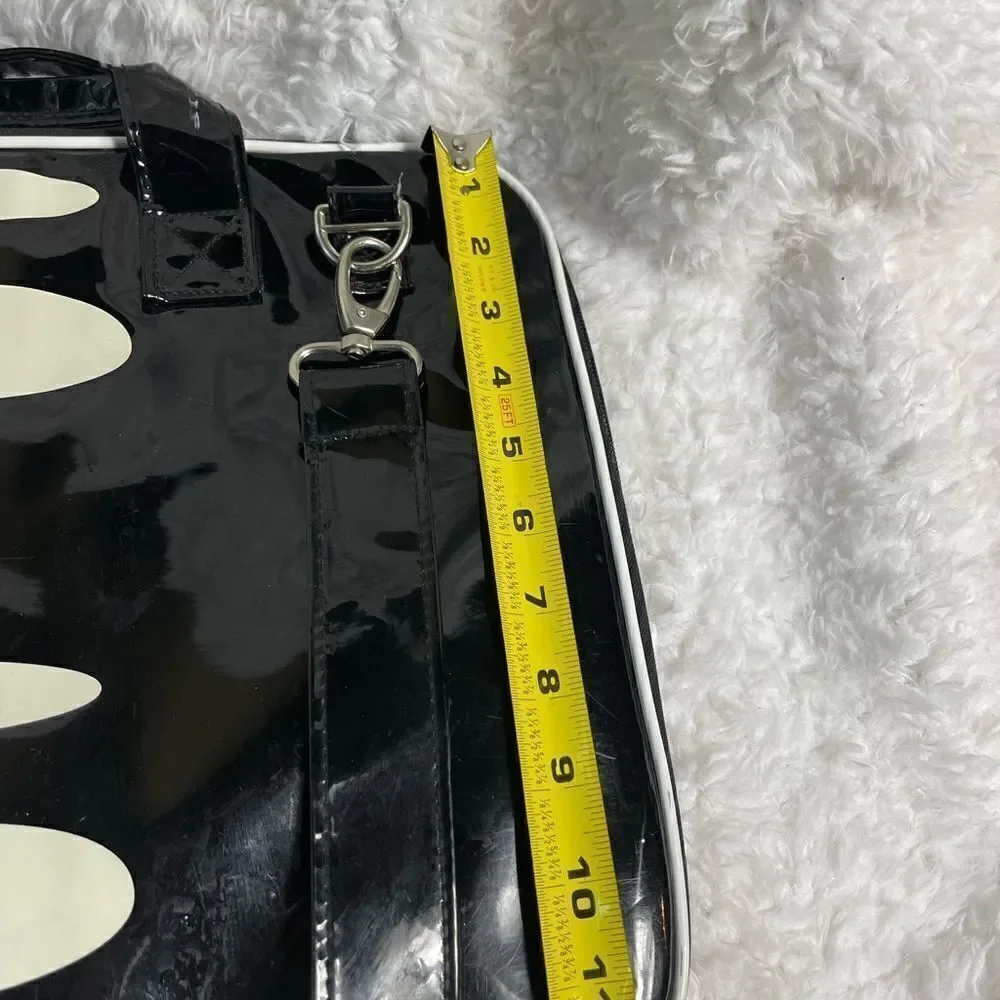 Black and white padded laptop bag with detachable padded shoulder strap